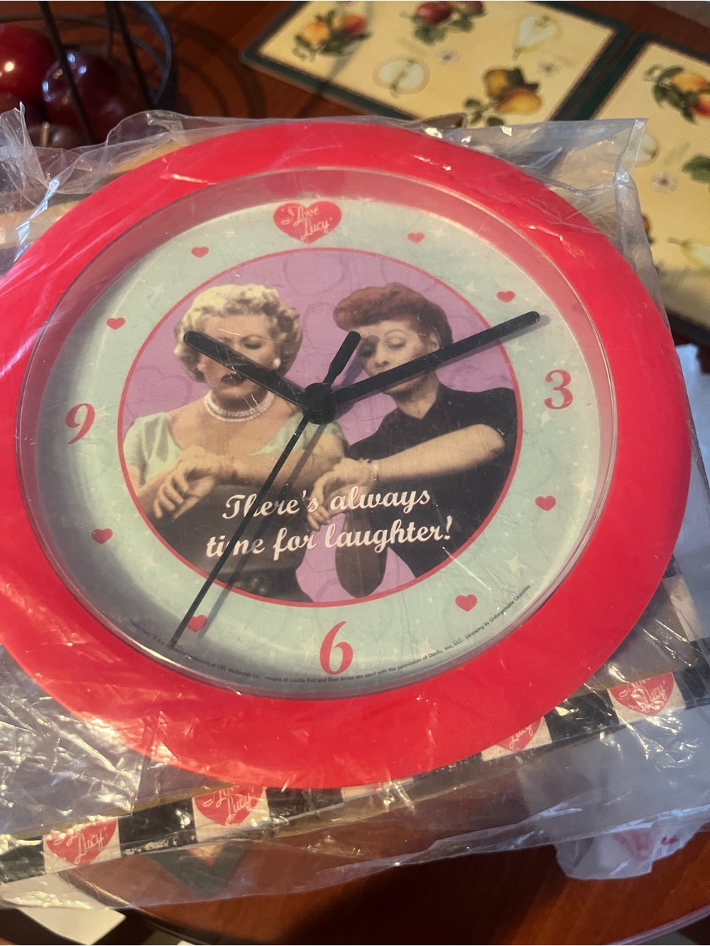 Red Retro-Style Wall Clock with Classic TV Duo Design